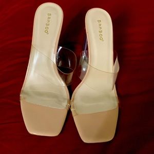Bamboo clear and tan heels size 10.